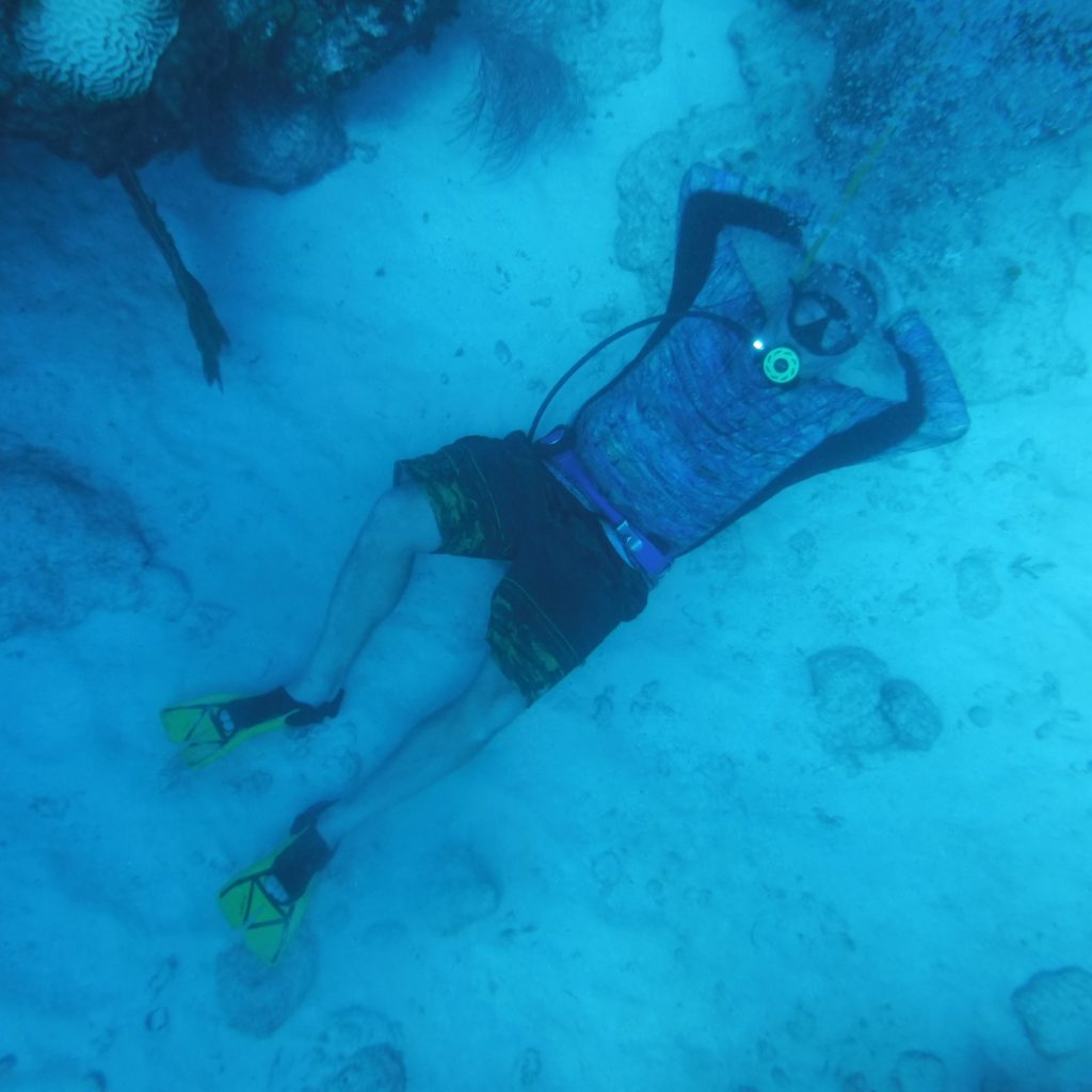 A relaxed diver posing at the surface using Gator Gill LLC scuba gear during a trip to Weeki Wachee FL
